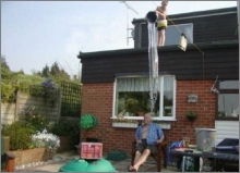 funny photo boy dump water roof